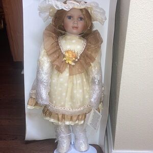 Twenty-Four Inch First Impressions Handcrafted Porcelain Doll